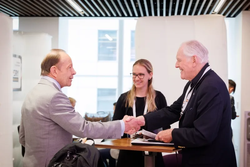 Investor connecting with a mining company representative at 121 New York